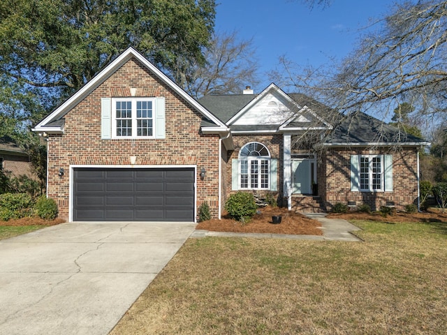 traditional home featuring brick siding, driveway, a chimney, and a front lawn