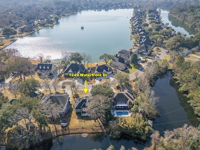 aerial view featuring a residential view and a water view