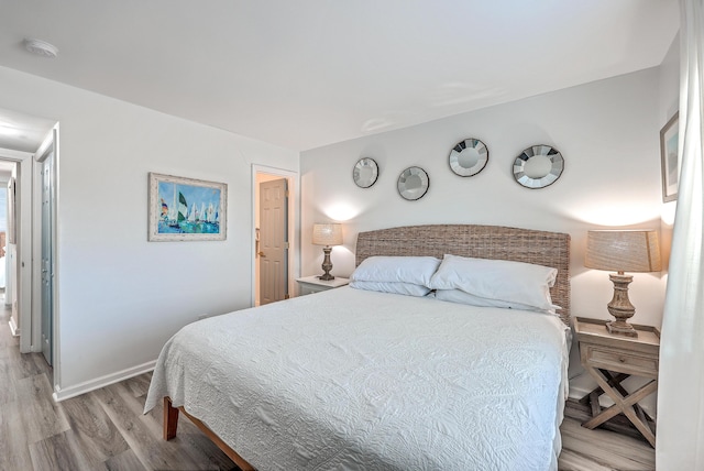 bedroom featuring light hardwood / wood-style floors