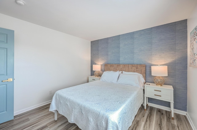 bedroom featuring light hardwood / wood-style floors