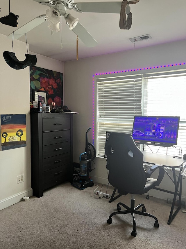 office area with ceiling fan and carpet