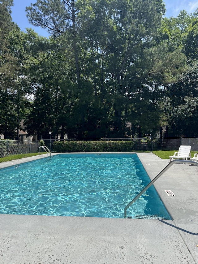 531 Travelers Blvd, Summerville, SC 29485 - community pool with view of scattered trees and a patio