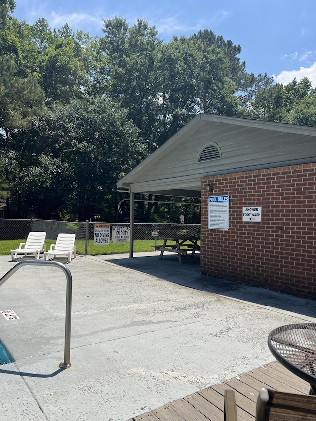 531 Travelers Blvd, Summerville, SC 29485 - deck featuring a carport and driveway