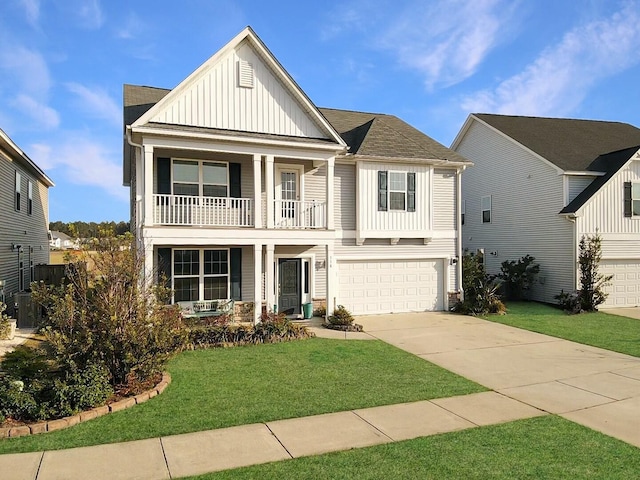 116 Rouen Ln, Summerville, SC 29486 - view of front of house featuring covered porch, board and batten siding, a balcony, a front lawn, and a garage