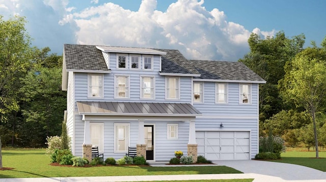 view of front of property with a garage and a front yard