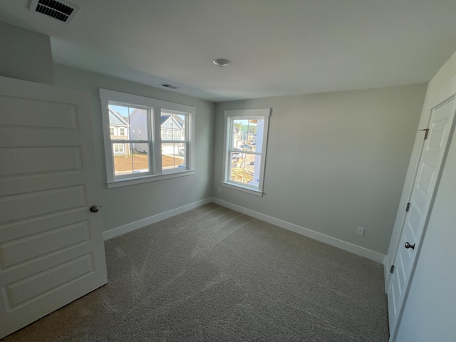 view of carpeted spare room