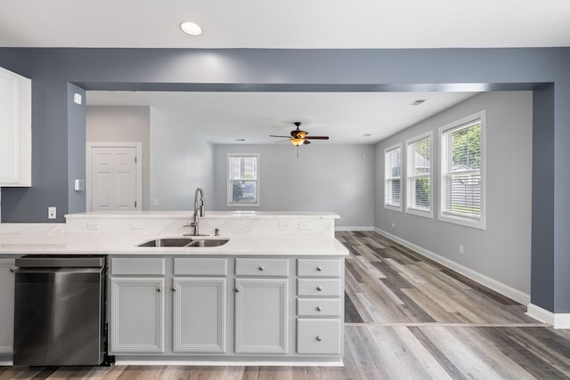 1070 Moss Grove Dr, Moncks Corner, SC 29461 - kitchen featuring dishwasher, a peninsula, ceiling fan, light wood-style flooring, and recessed lighting