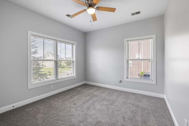 1070 Moss Grove Dr, Moncks Corner, SC 29461 - carpeted spare room with baseboards and ceiling fan