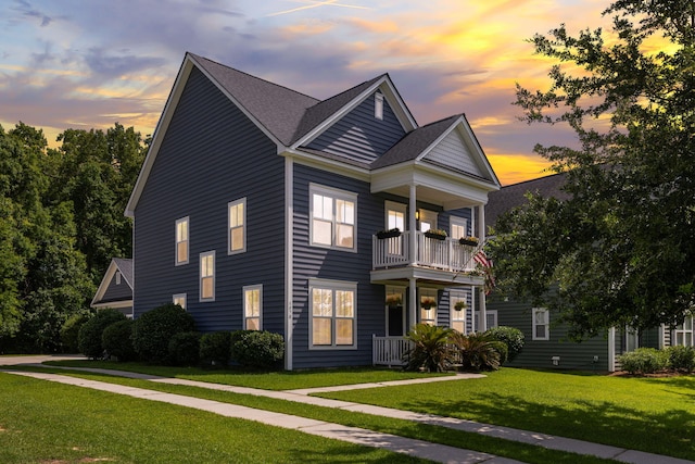 1070 Moss Grove Dr, Moncks Corner, SC 29461 - view of front facade featuring a balcony and a front yard