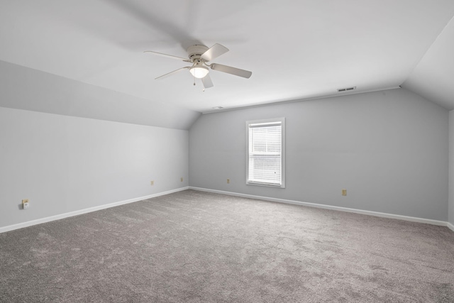 1070 Moss Grove Dr, Moncks Corner, SC 29461 - additional living space with lofted ceiling, a ceiling fan, and carpet