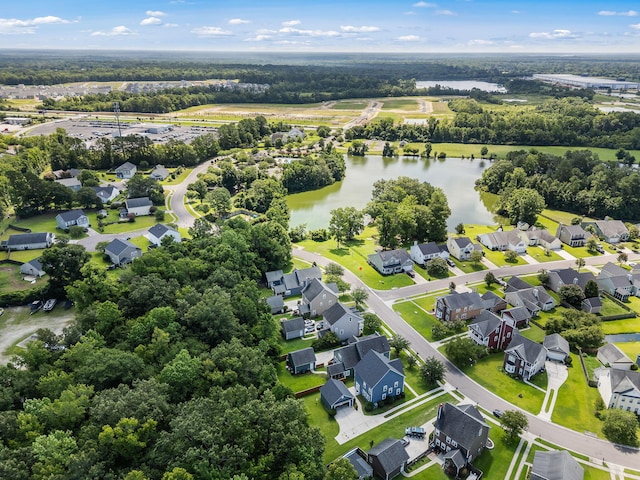 1070 Moss Grove Dr, Moncks Corner, SC 29461 - aerial view of residential area with a nearby body of water and a tree filled landscape