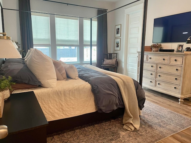 bedroom featuring light hardwood / wood-style floors