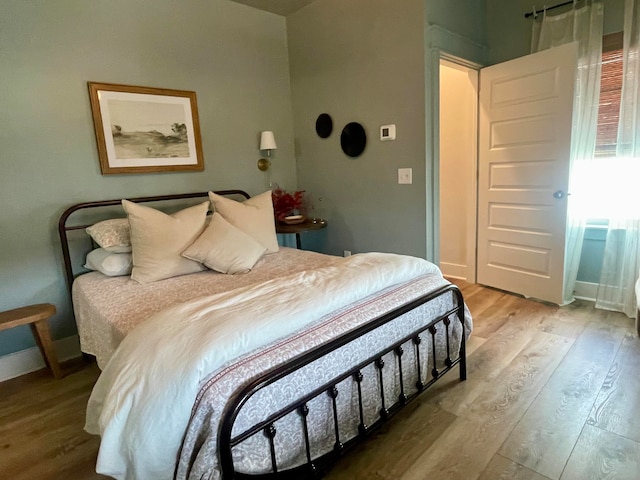 bedroom featuring light hardwood / wood-style flooring