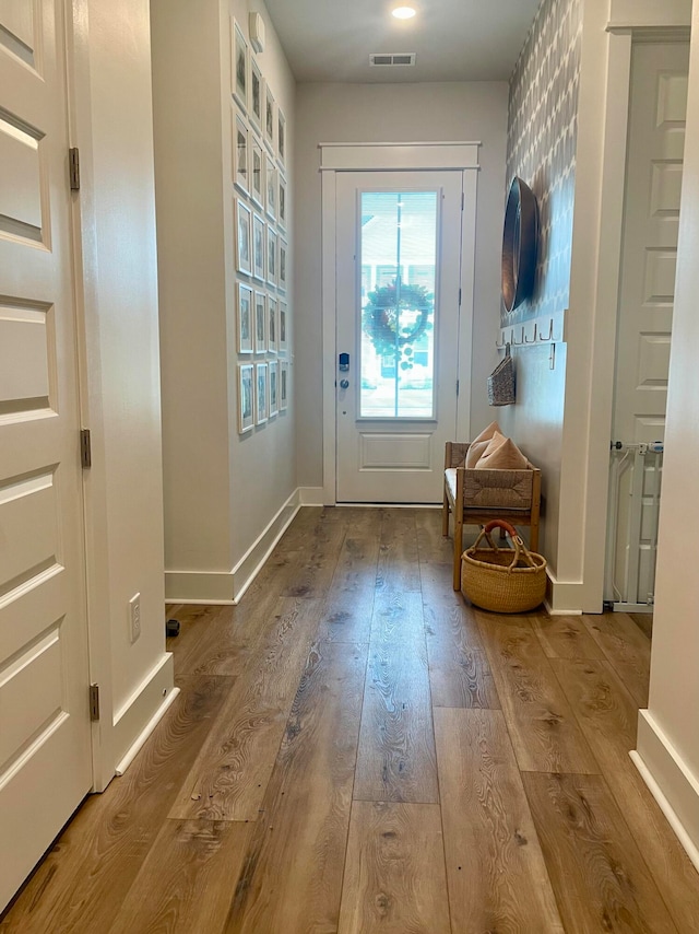 doorway featuring hardwood / wood-style floors