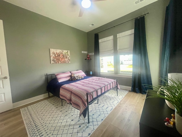 bedroom featuring ceiling fan and light hardwood / wood-style floors