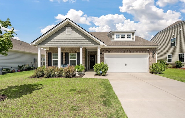 143 Daniels Creek Cir, Goose Creek, SC 29445 - view of front of home featuring brick siding, a front yard, an attached garage, and driveway