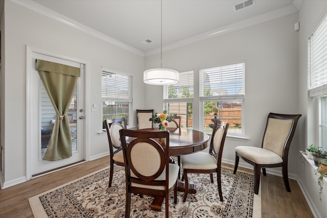 143 Daniels Creek Cir, Goose Creek, SC 29445 - dining room featuring wood finished floors, ornamental molding, and baseboards