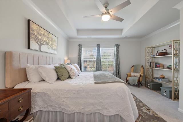 143 Daniels Creek Cir, Goose Creek, SC 29445 - bedroom with a tray ceiling, carpet flooring, and ceiling fan