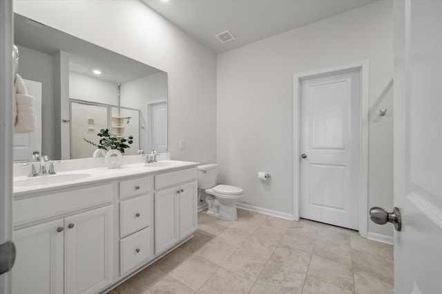 143 Daniels Creek Cir, Goose Creek, SC 29445 - bathroom featuring a shower stall, double vanity, baseboards, and toilet