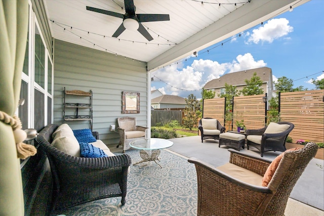 143 Daniels Creek Cir, Goose Creek, SC 29445 - fenced backyard with an outdoor living space, a ceiling fan, and a patio area
