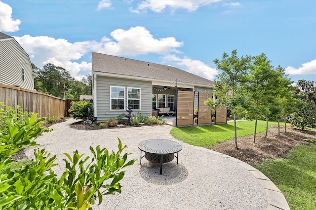 143 Daniels Creek Cir, Goose Creek, SC 29445 - back of property with a patio area and an outdoor fire pit