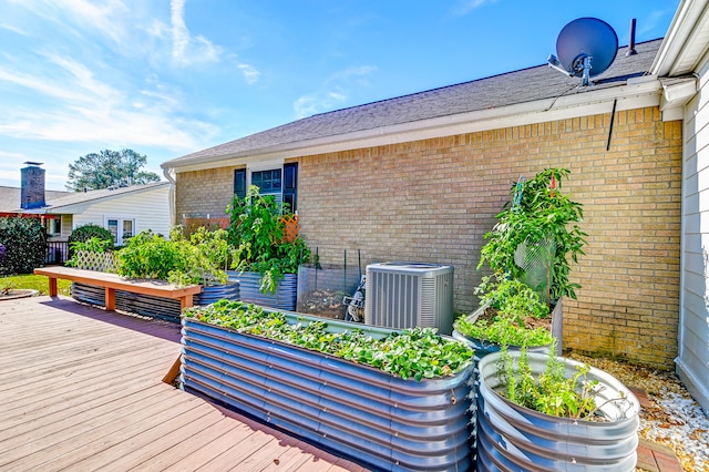 wooden terrace with central AC unit