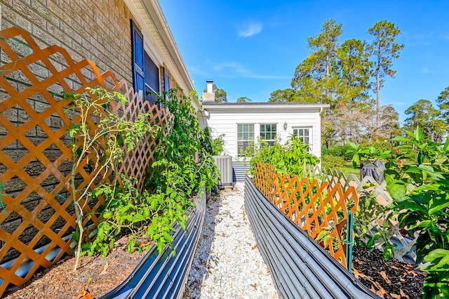 view of home's exterior featuring central AC