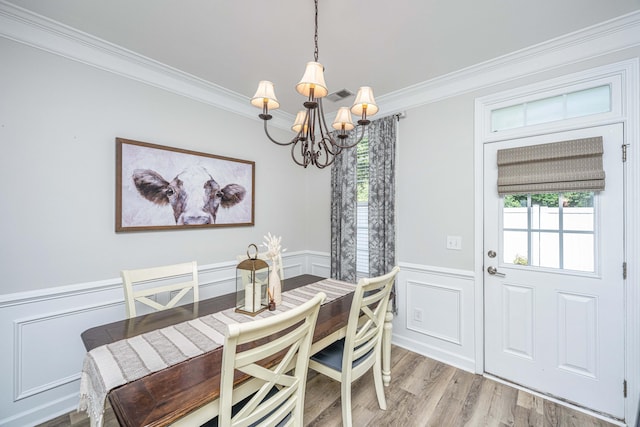 754 Certificate Ct, Charleston, SC 29414 - dining space with a chandelier, ornamental molding, a decorative wall, and plenty of natural light
