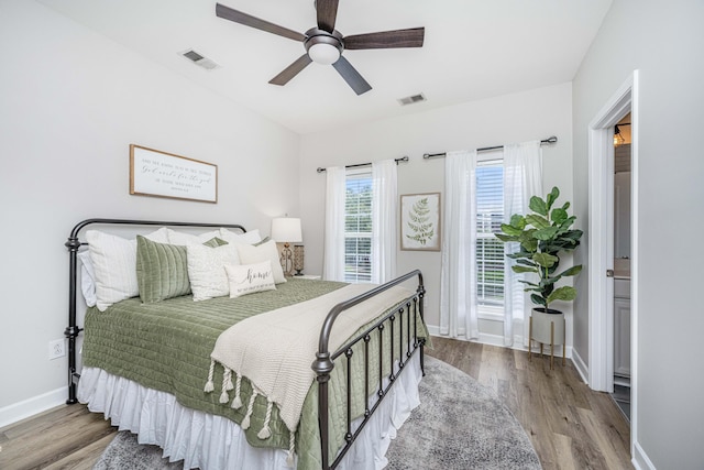 754 Certificate Ct, Charleston, SC 29414 - bedroom with baseboards, visible vents, and wood finished floors