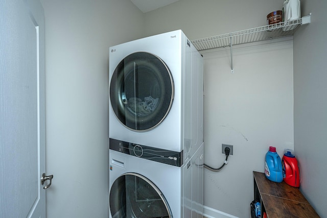 754 Certificate Ct, Charleston, SC 29414 - washroom featuring baseboards, stacked washer and dryer, and laundry area