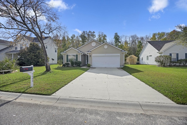 view of front of property featuring a garage and a front lawn