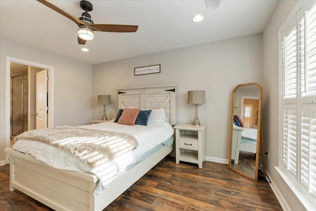 bedroom featuring dark hardwood / wood-style flooring and ceiling fan