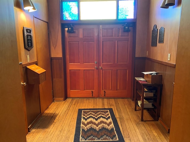 foyer with light hardwood / wood-style floors