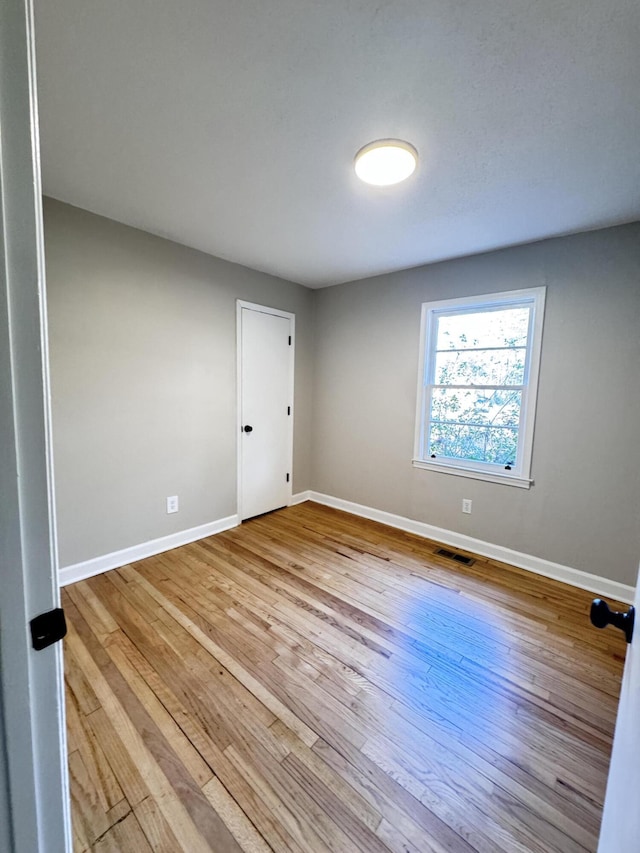 114 Madison St, Walterboro, SC 29488 - unfurnished room with hardwood / wood-style flooring and baseboards