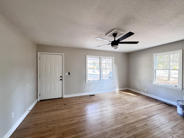 114 Madison St, Walterboro, SC 29488 - foyer featuring ceiling fan, wood-type flooring, and a textured ceiling