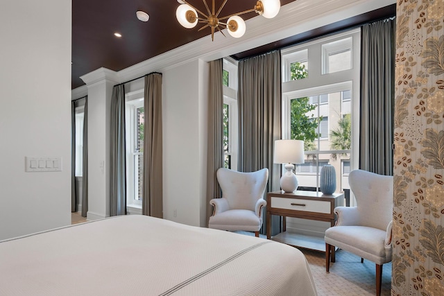 32 Prioleau St Unit J, Charleston, SC 29401 - bedroom featuring ornamental molding and a chandelier
