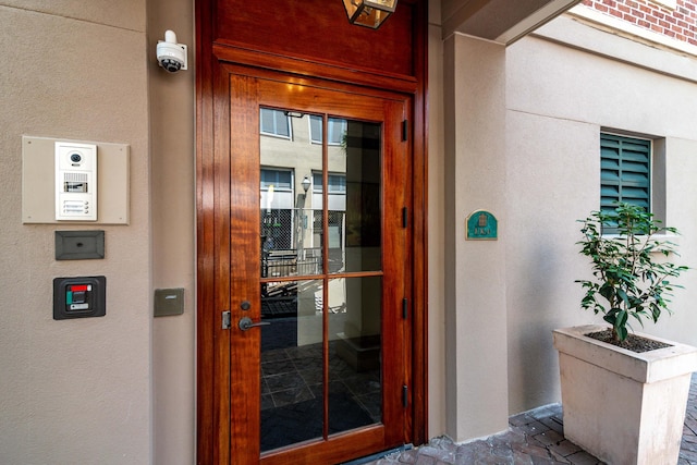 32 Prioleau St Unit J, Charleston, SC 29401 - entrance to property featuring a surveillance system and stucco siding