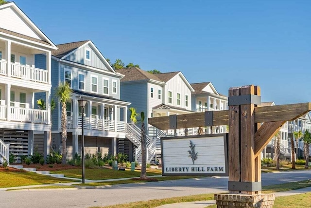 view of front facade featuring board and batten siding and a residential view