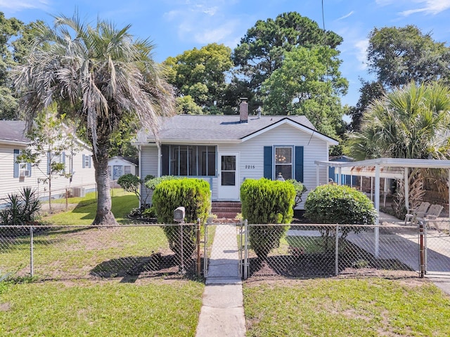2215 Suffolk St, North Charleston, SC 29405 - view of front facade with a gate, a fenced front yard, and a chimney