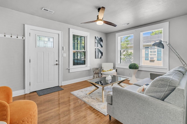2215 Suffolk St, North Charleston, SC 29405 - living area with wood finished floors and ceiling fan