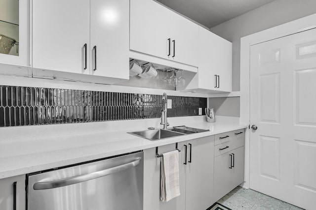 2215 Suffolk St, North Charleston, SC 29405 - kitchen featuring dishwasher, white cabinetry, light stone counters, and glass insert cabinets