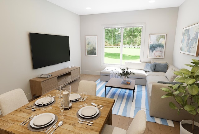 living room with recessed lighting, baseboards, and wood finished floors
