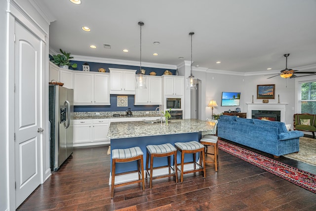 3769 Maidstone Dr, Mount Pleasant, SC 29466 - kitchen with stainless steel appliances, open floor plan, ceiling fan, recessed lighting, and light stone counters