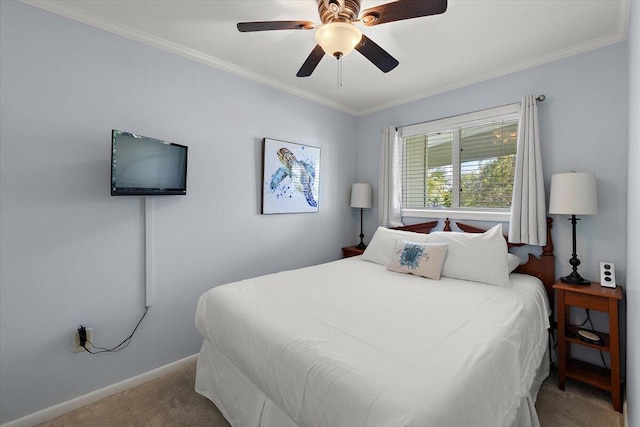 bedroom with crown molding, ceiling fan, and carpet floors