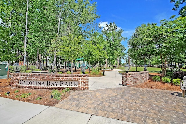 view of home's community featuring playground community