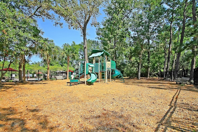 community playground featuring fence