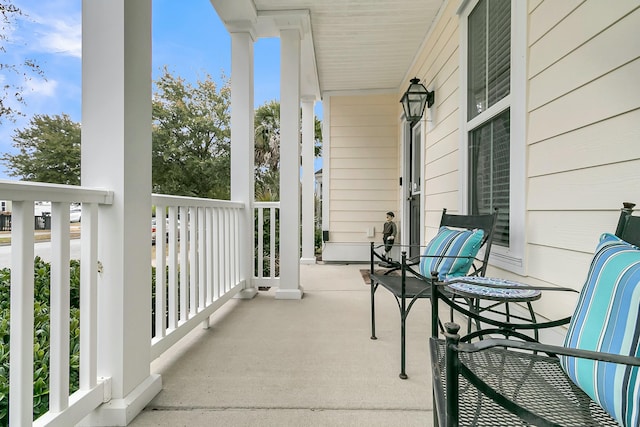 balcony featuring a porch