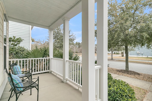 balcony featuring a porch