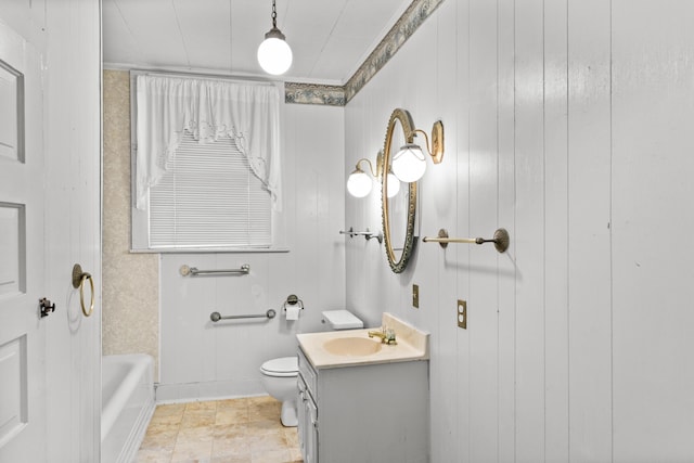 full bathroom with toilet and vanity