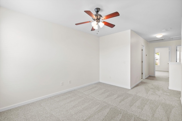 9747 Seed St, Ladson, SC 29456 - empty room featuring carpet flooring, baseboards, and a ceiling fan